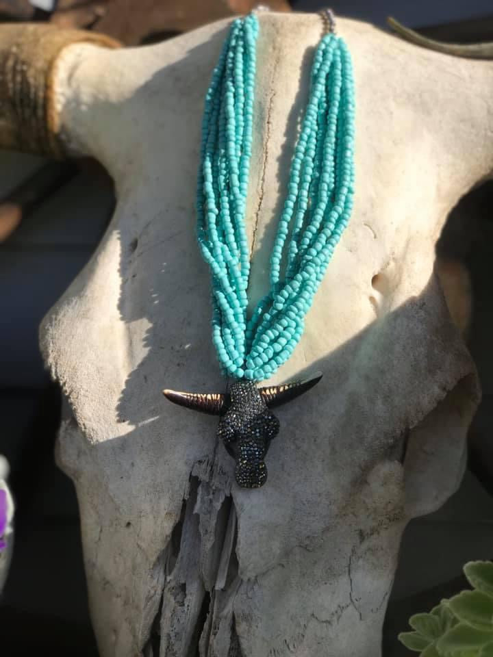 Turquoise necklace with sparkly cowhead 